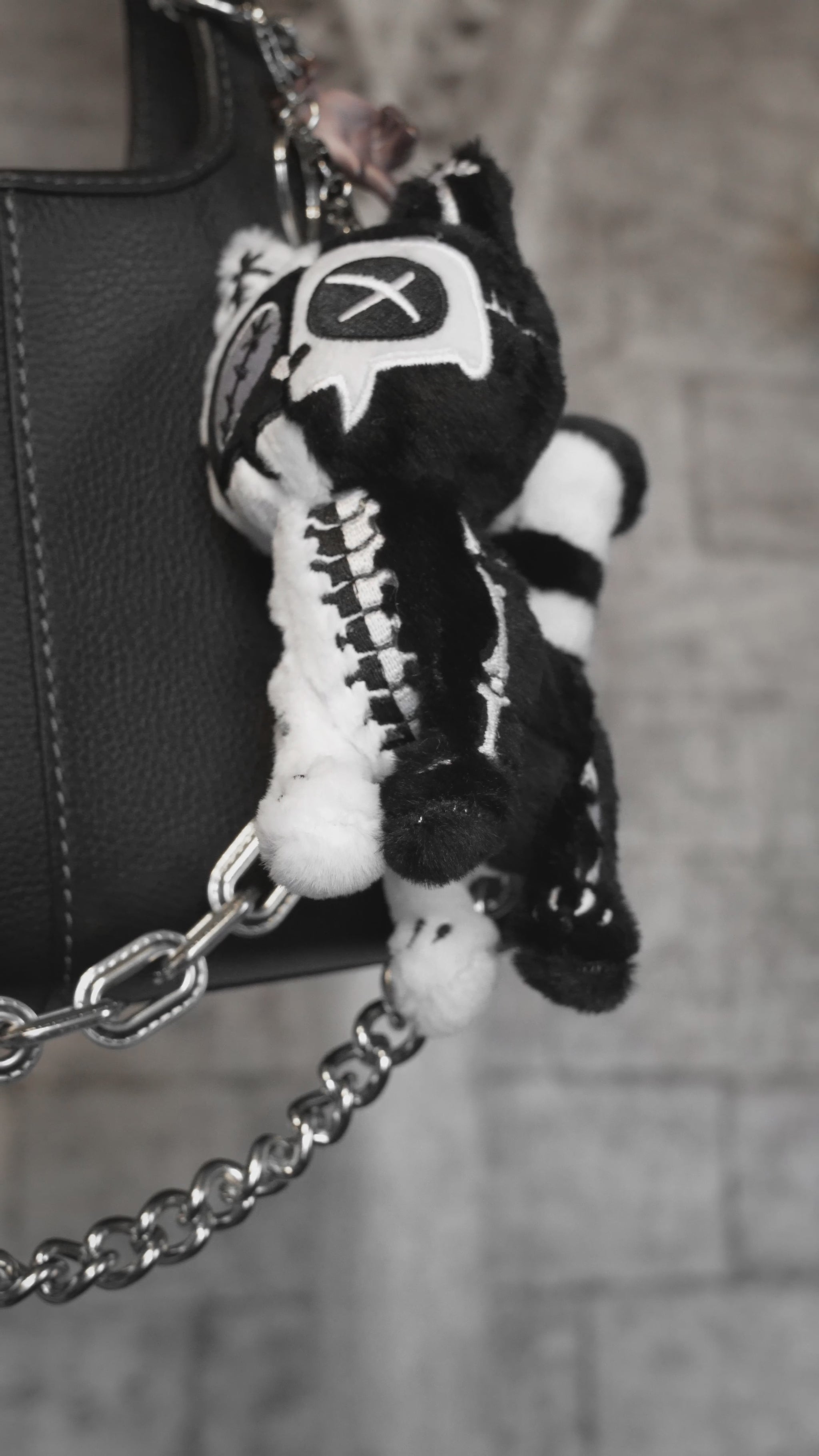 video of a halloween creepy cat plush keychain