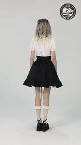video of a lolita woman wearing a white puff shoulder short sleeve button up blouse