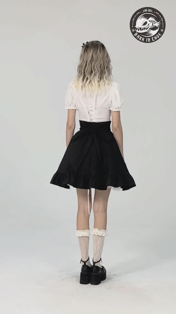 video of a lolita woman wearing a white puff shoulder short sleeve button up blouse