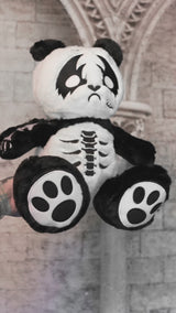 video of a spooky skeleton stitched heavy metal panda plush