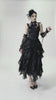 video of a gothic woman wearing a Victorian gothic sexy ruffled hem damask tank top