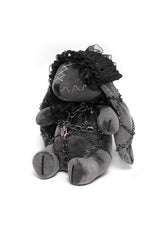 chained punk rabbit plush toy wearing a lolita ruffle headband 