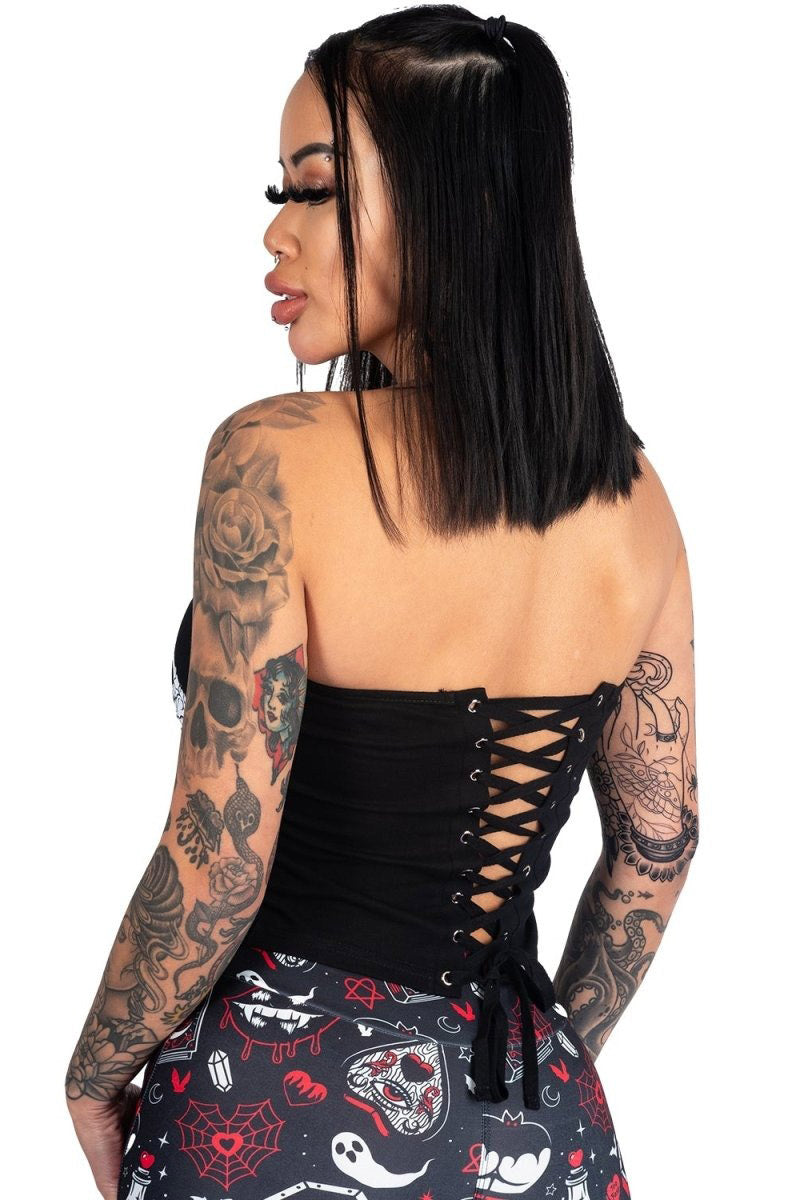 emo sleeveless top with corset laces on ther back