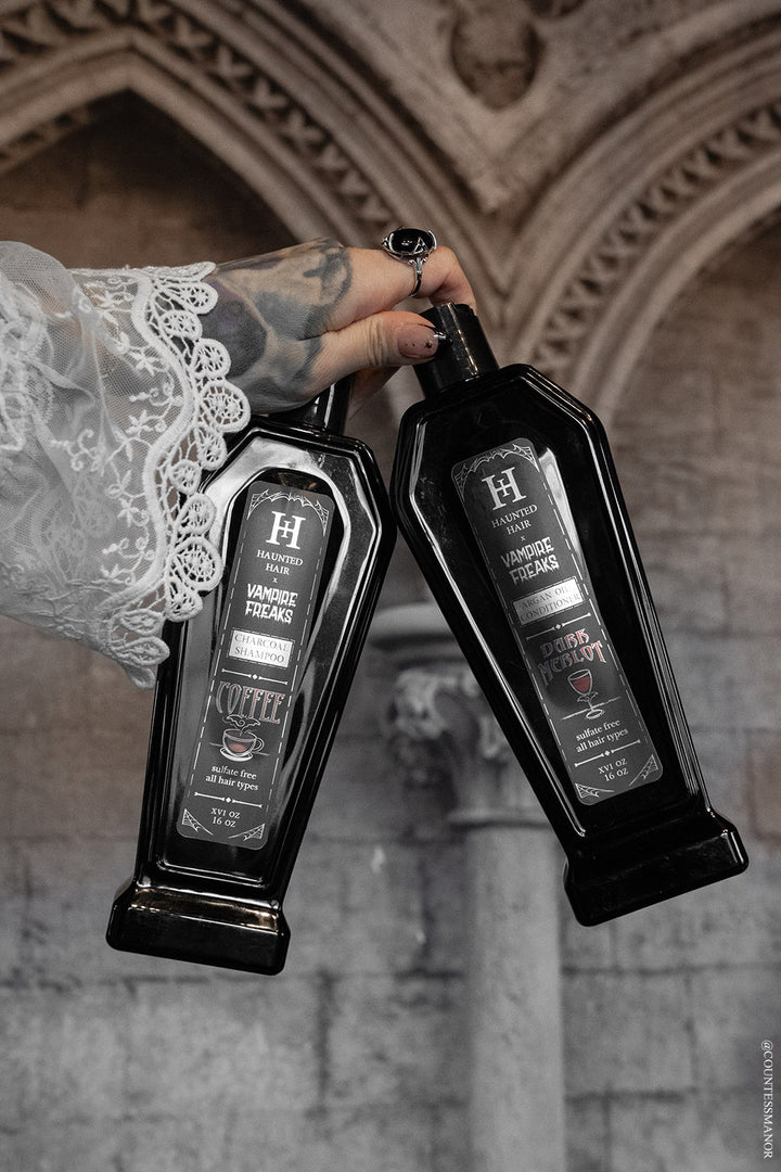 gothic coffin shaped bottles holding shampoo and conditioner by haunted hair and vampirefreaks
