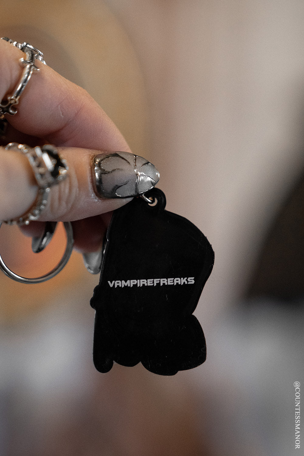 creepy cute grim reaper keychain