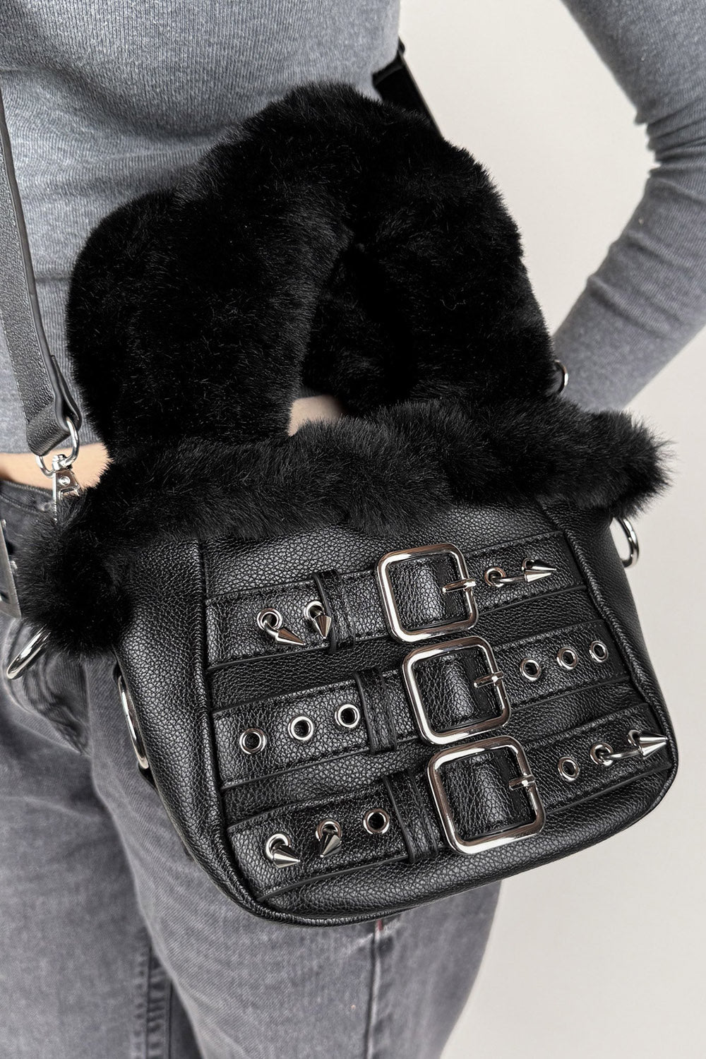 small punk black vegan fur purse with piercings 