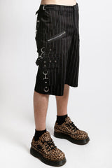 Person wearing a black pinstripe shorts for men with decorative elements on a white background