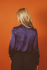womens witchy deep rich purple satin button up collared shirt with cuffs and billowy sleeves