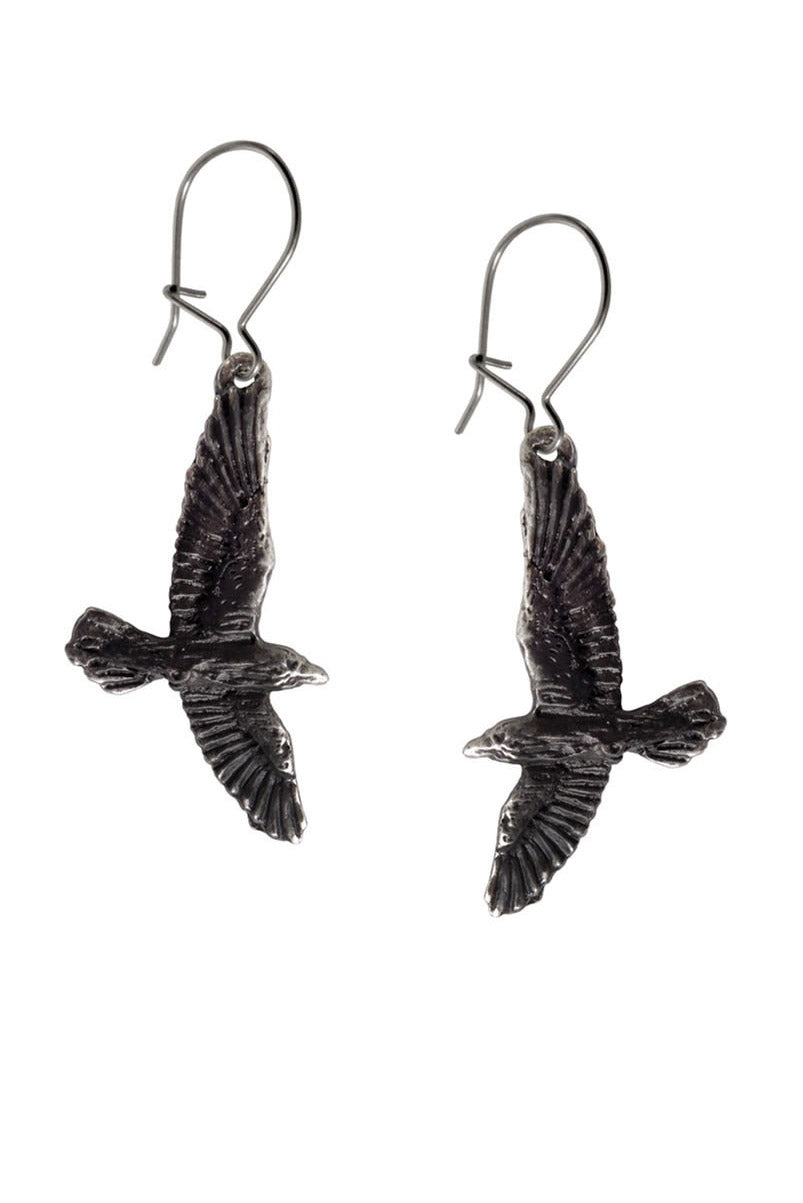 Pair of bird-shaped earrings on a white background