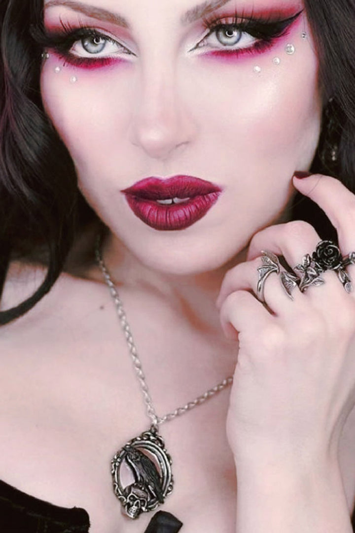 alchemy england gothic raven pendant necklace with skull and cameo frame on metal trace chain