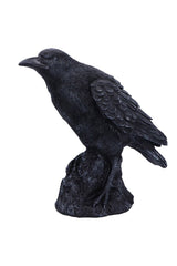 gothic raven on rock statue