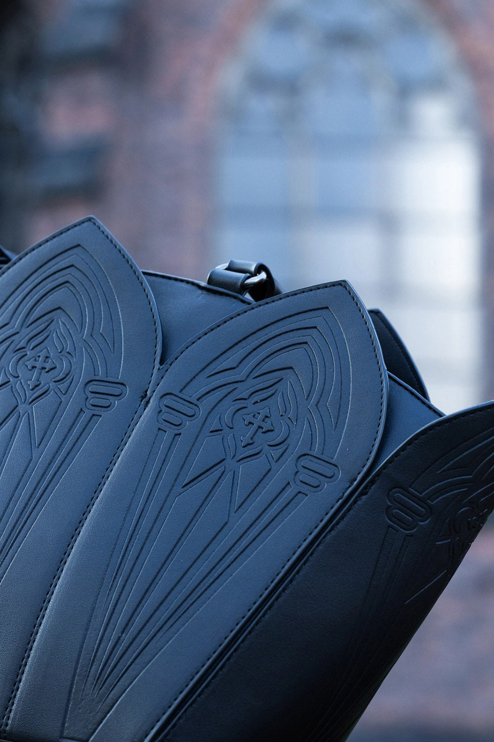 dark gothic cathedral purse with red interior lining 