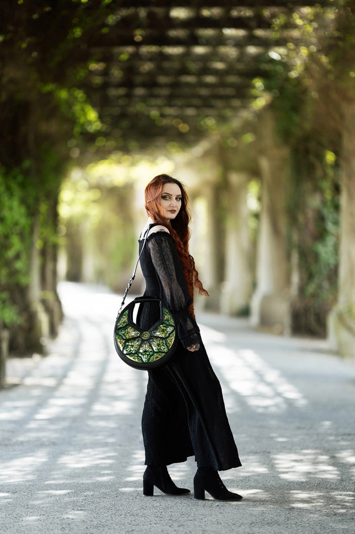 circular green crescent shoulder bag