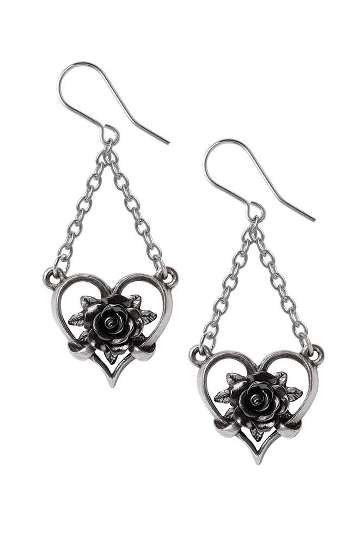 Pair of silver heart-shaped earrings with rose designs on a white background