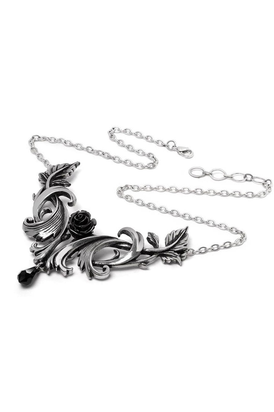 Ornate silver rose necklace on a white background