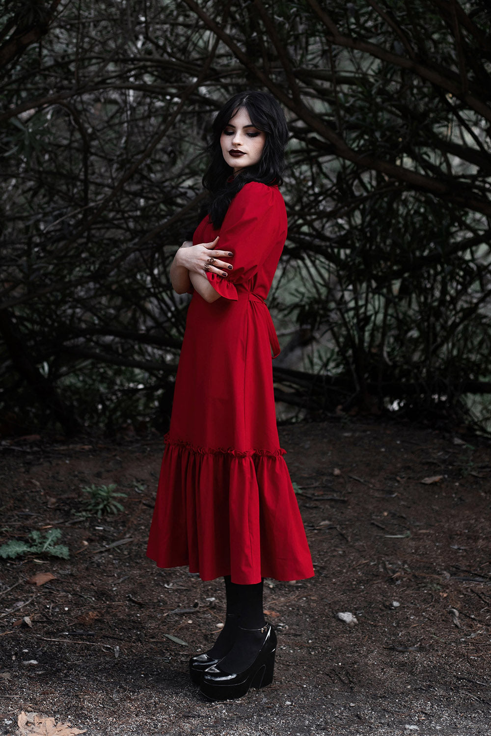 pleated mini dress with ruffled sleeves