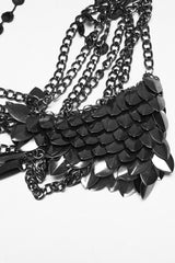 chainmail harness ith draped chains