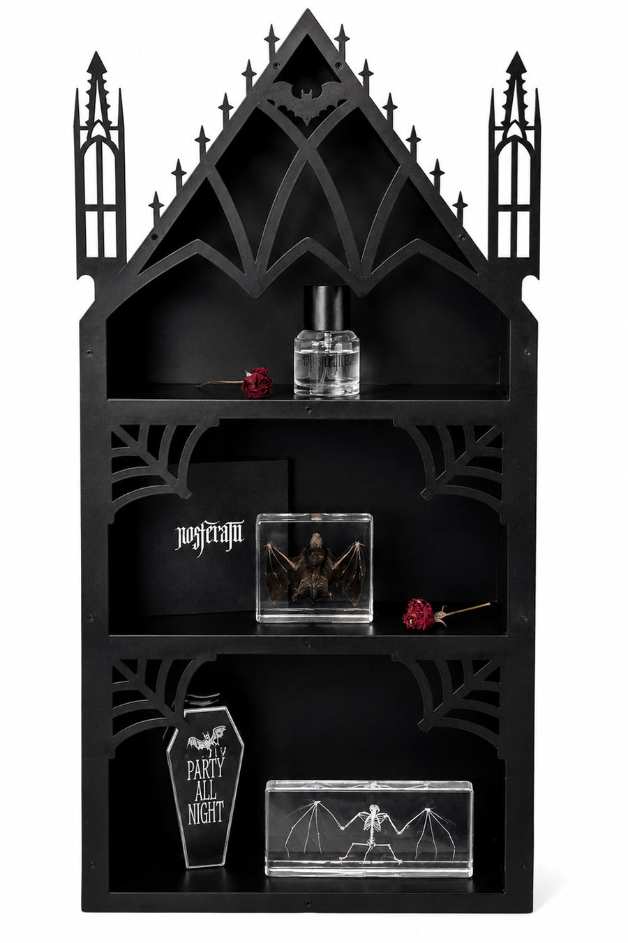 Black gothic-style shelf with decorative items on a white background