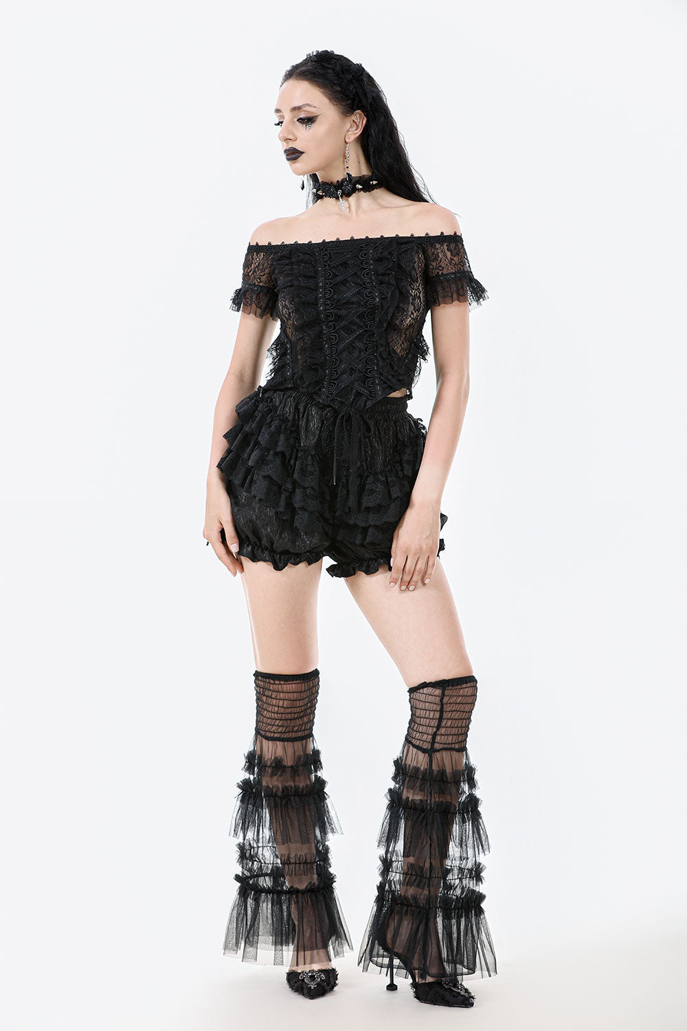 Model wearing goth fashion ruffle shorts