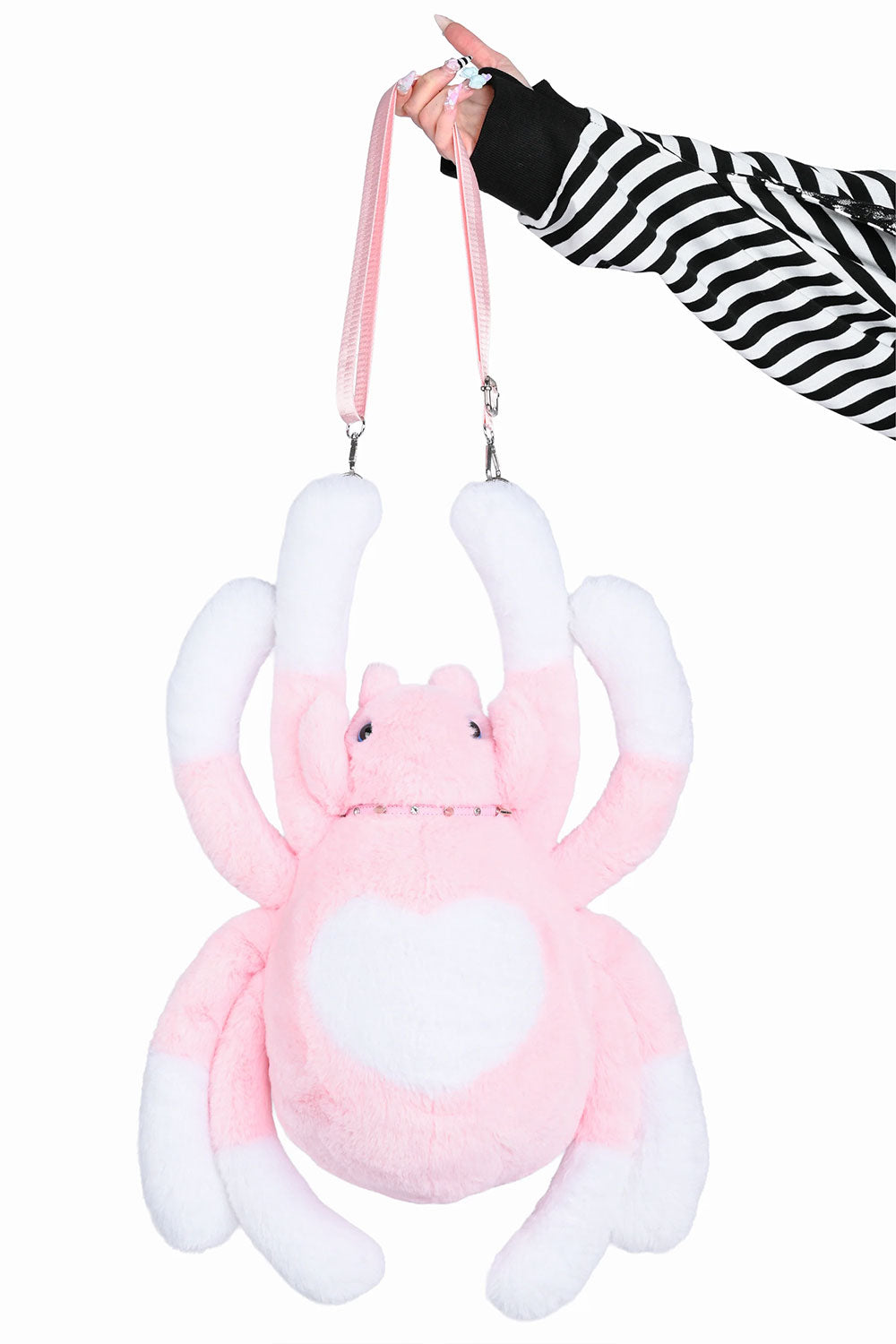 Pink spider themed sling bag with gothic details for pastel goth punk and grunge inspired outfits