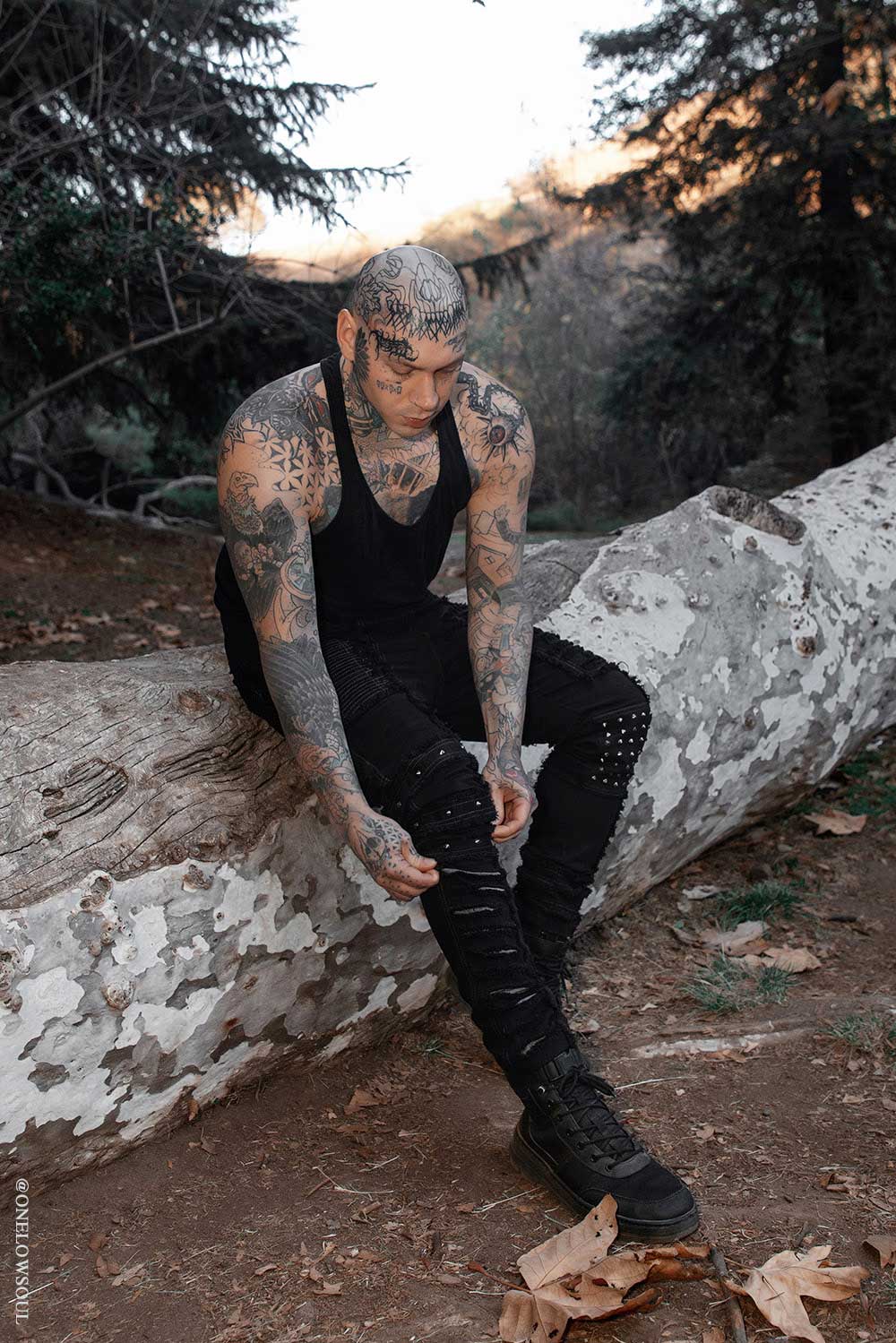 mens black distressed shredded and studded pants