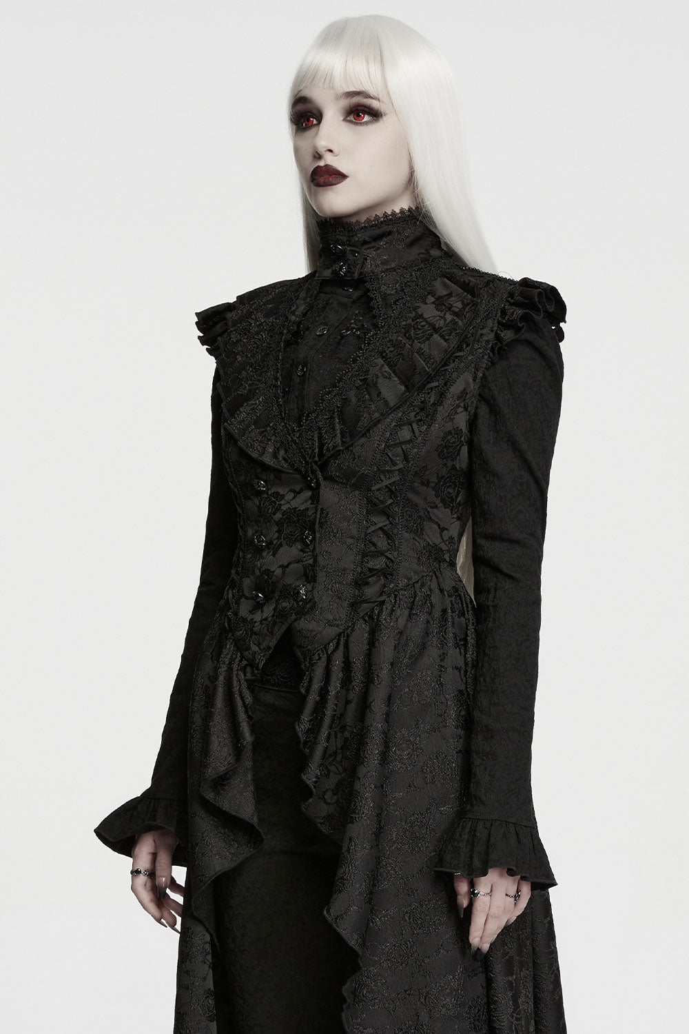model wearing black long vest with ruffles and lace from Punk Rave