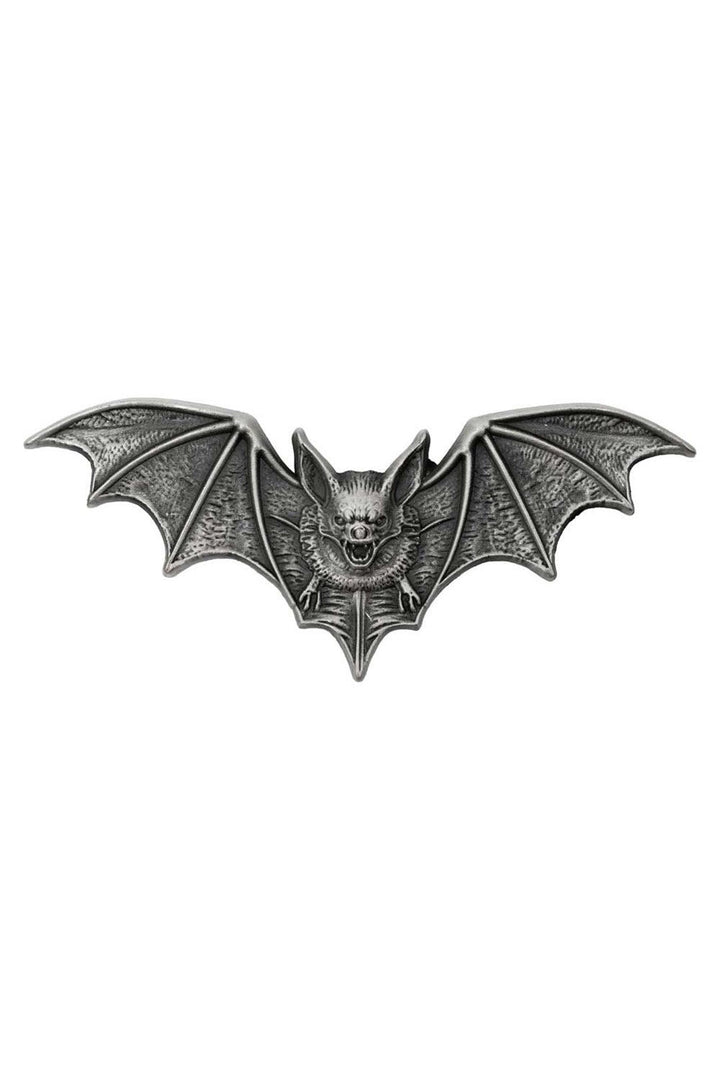 silver bat-shaped brooch