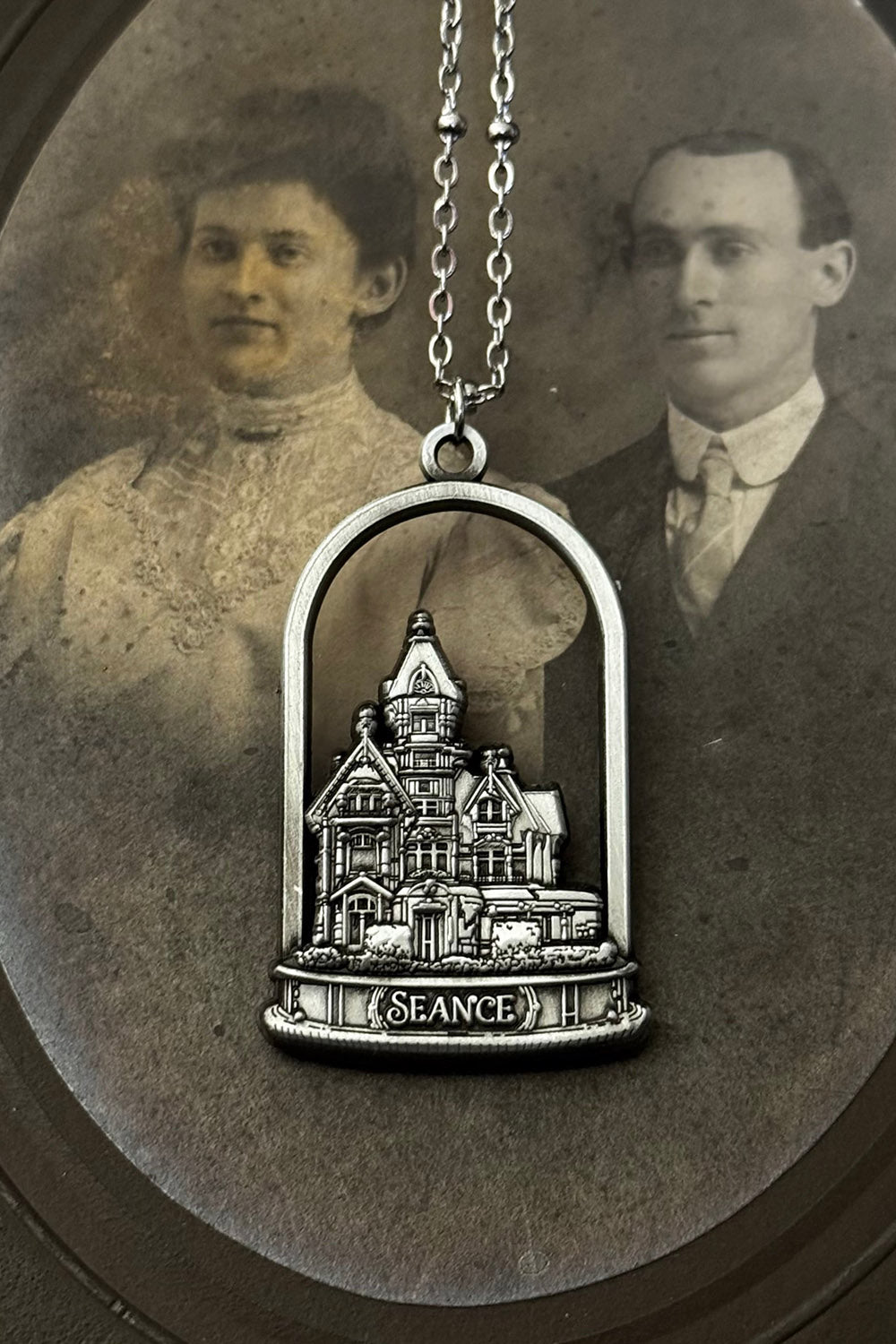 silver haunted house necklace by seance