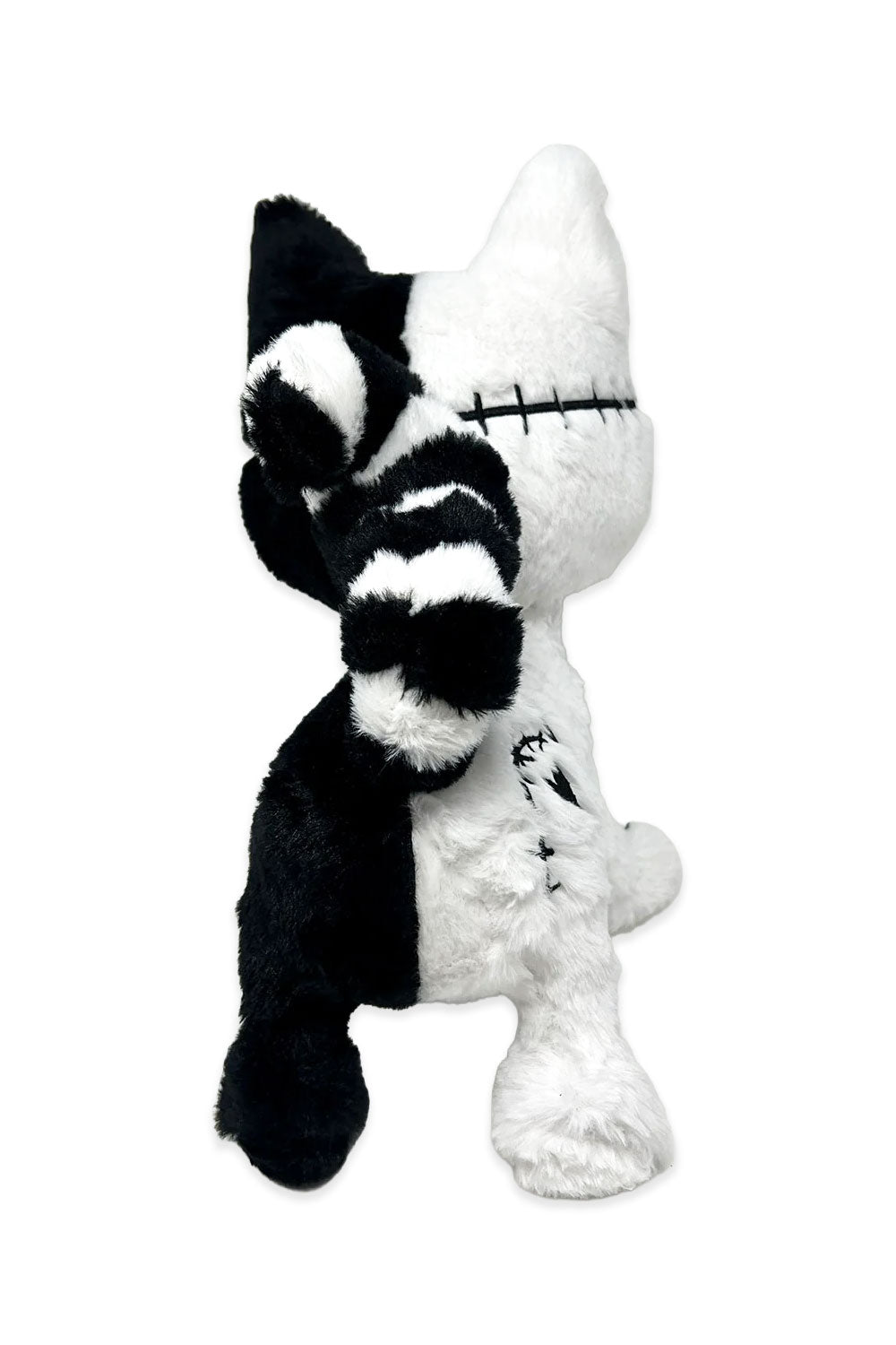 Skeleton cat plush decor with fluffy black and white tail