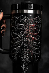 Tumbler with bleeding heart rib cage printed graphic