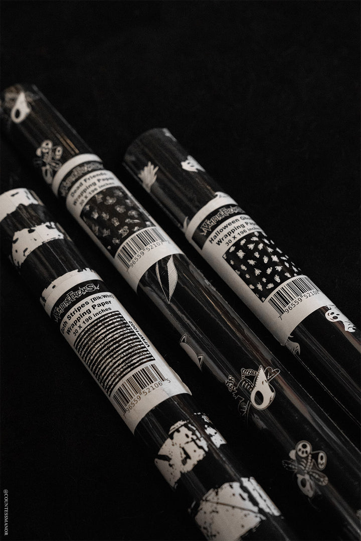 gothic skeleton wrapping paper  adn other rolls of goth gift wrap