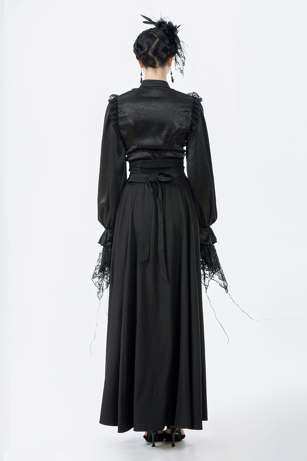 Back view of model wearing Dark In Love Gothic embroidered maxi skirt