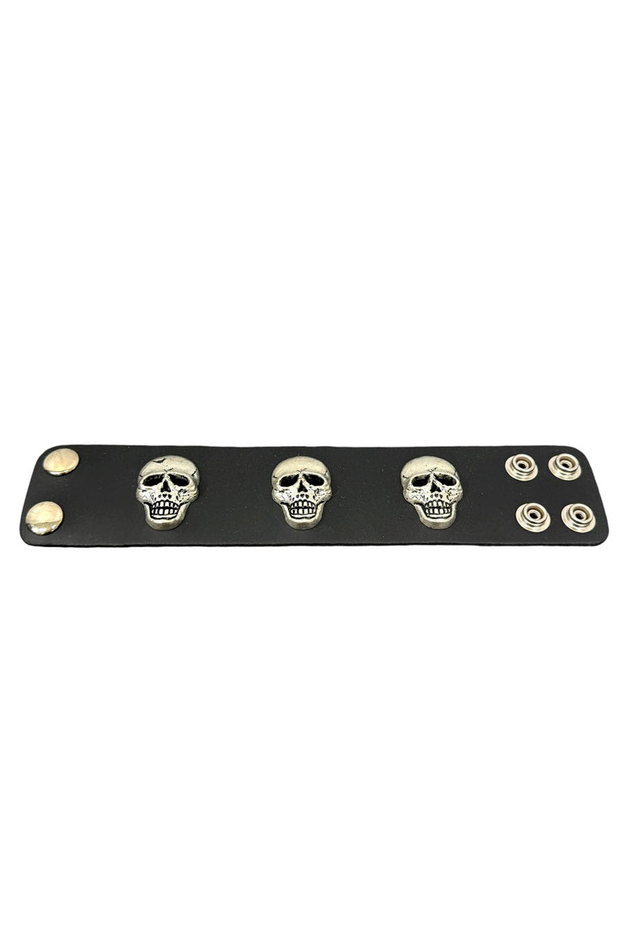 punk cuff bracelet with three skull charms 