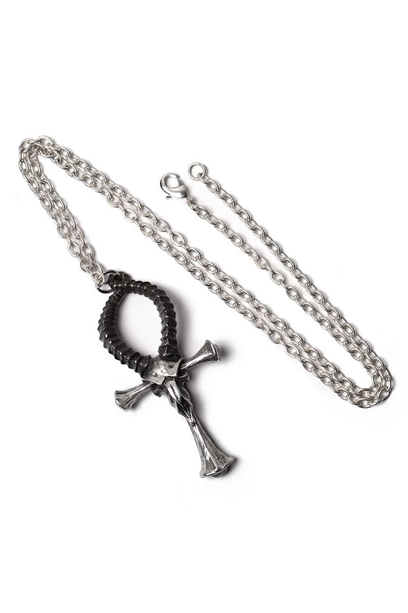 Necklace with a cross pendant on a white background