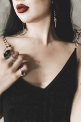 black dress with chain straps 