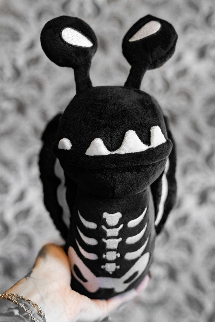 black and white embroidered skeleton snail slug bug insect plushie stuffed animal toy