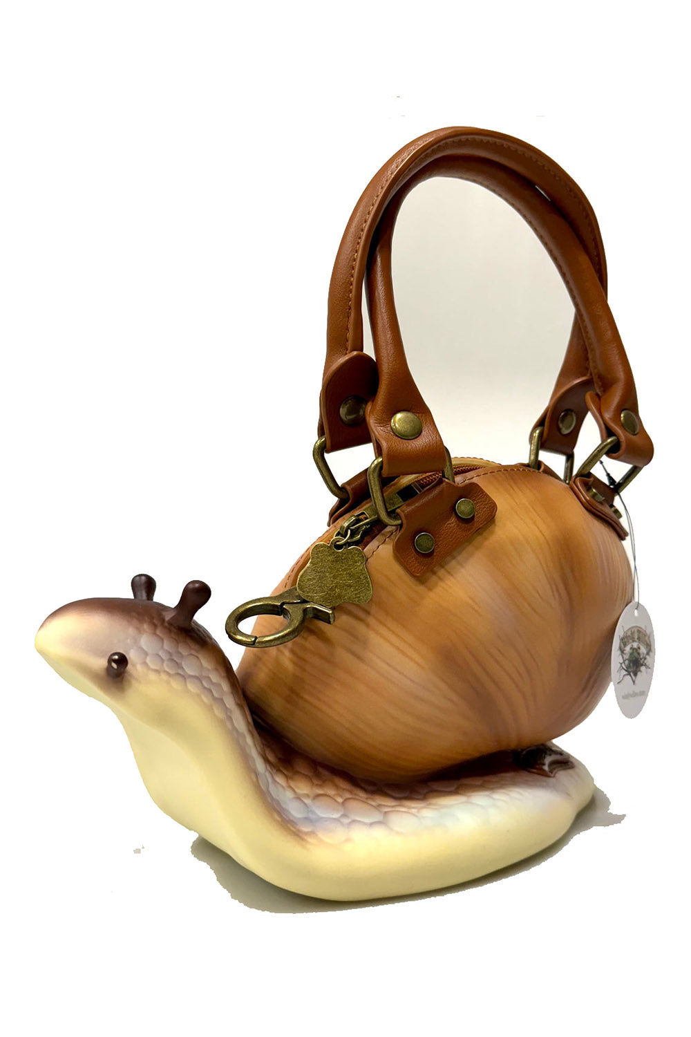Snail-shaped handbag with a leather handle on a white background