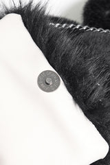 Backpack button closure