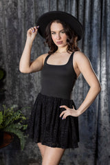stretchy spiderweb romper by witchwood bags