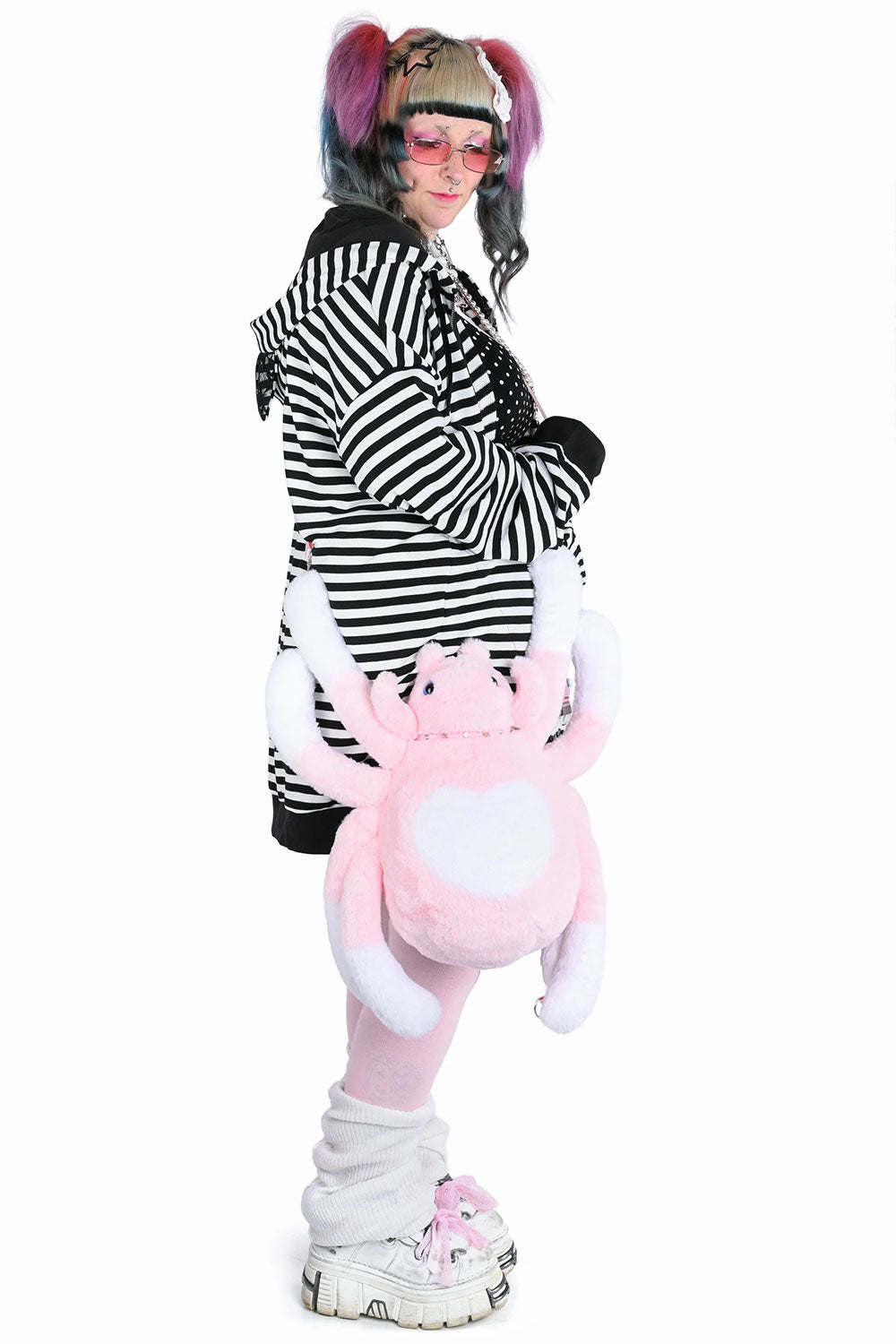 Cute pink spider convertible backpack with edgy alternative aesthetic for pastel goth and Y2K grunge style