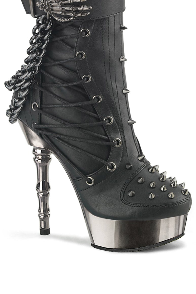 skeleton had buckle boots with chains and studs