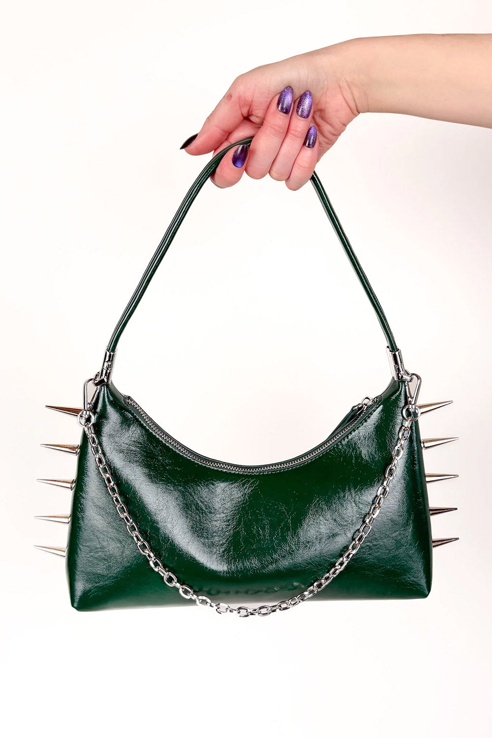 green spiked handbag