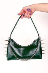 green spiked handbag