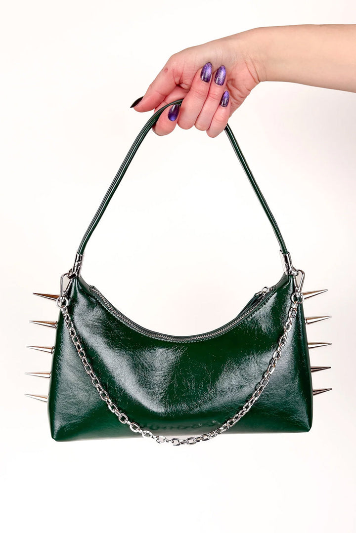 green spiked handbag