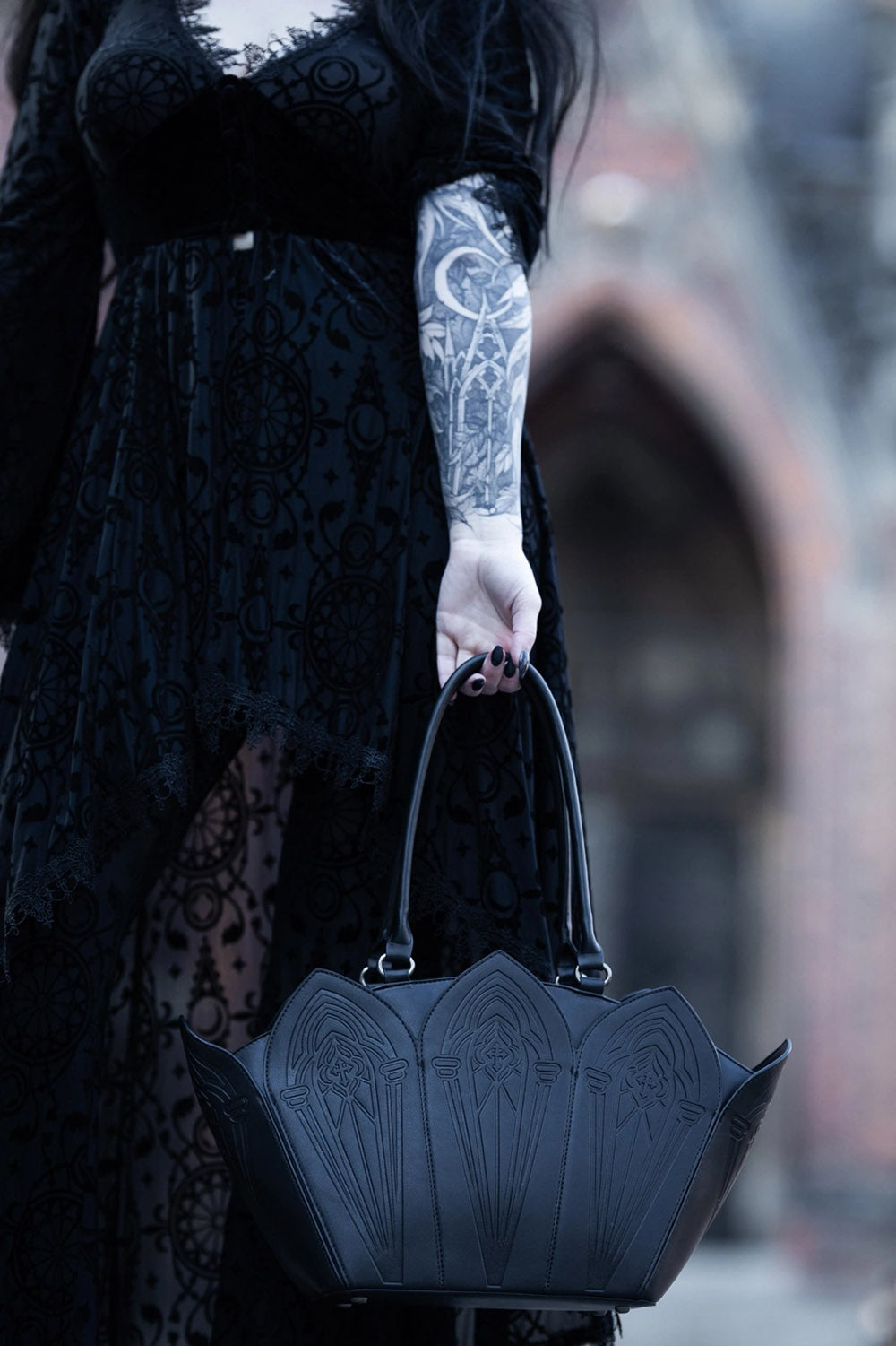 witchy gothic cathedral purse with red interior lining 