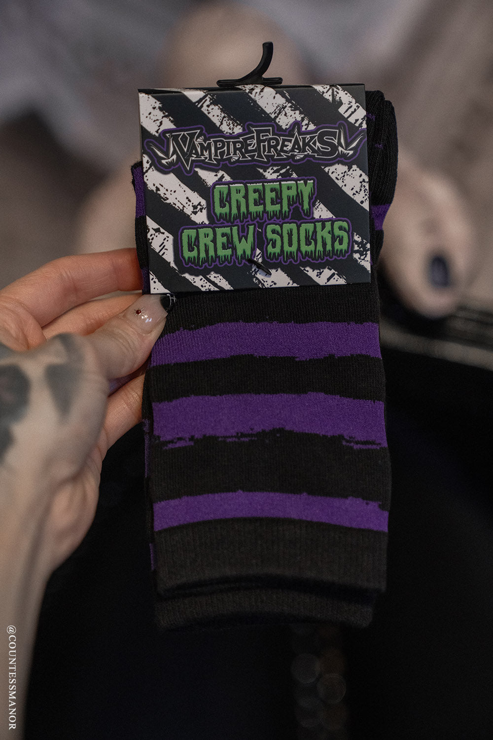 distressed purple and black striped socks