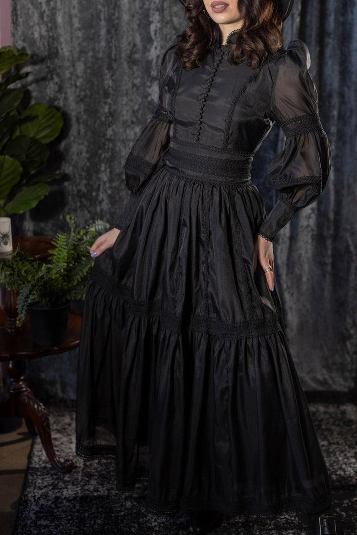 black victorian woman in black gothic dress