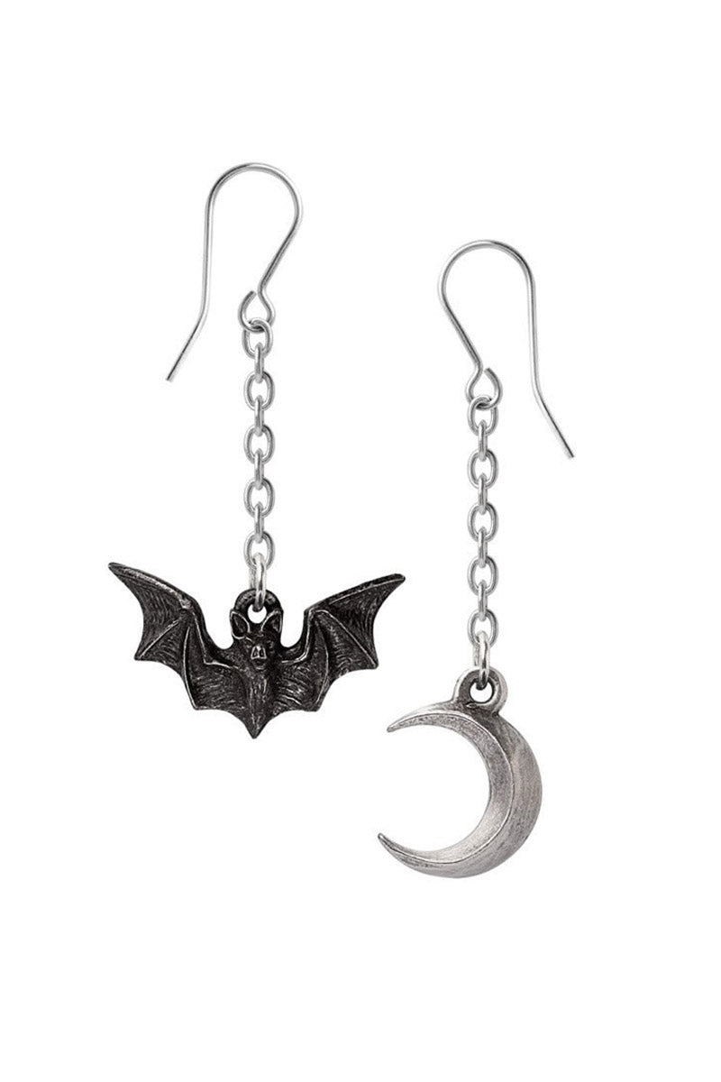 Bat and moon earrings on a white background