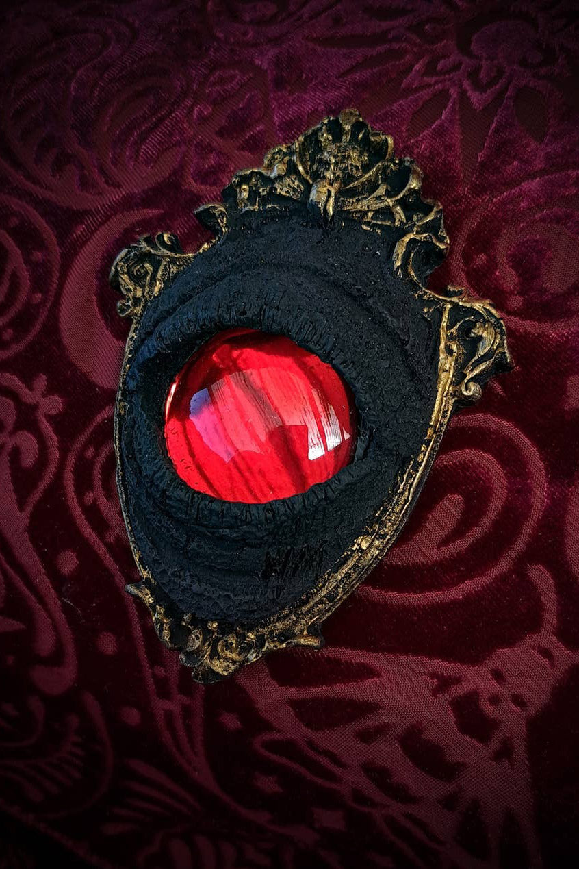 monster eye wall art on ornate gold victorian frame 