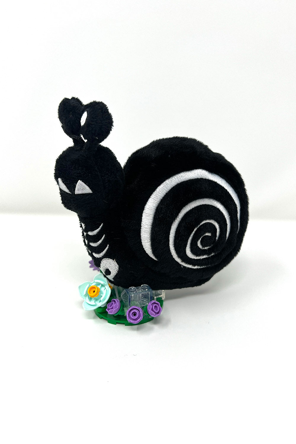 spooky snail plush keychain
